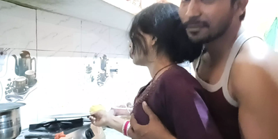 Scorching Indian teen with big tits gets frisky in the kitchen with her bf